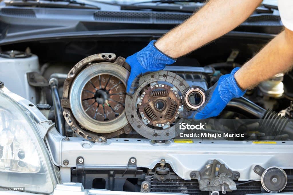 clutch disc and release bearing in front of the vehicle engine Clutch Repairs Reading